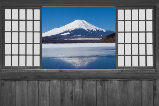 Fototapeta Japanese wood sliding window with view of mountain fuji and lake