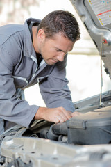 Mechanic repairing an engine