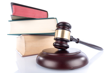 Judge hammer with law books, isolated on white
