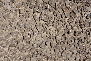 Gray stone stylized wall texture.