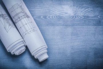 copyspace image white rolled blueprints