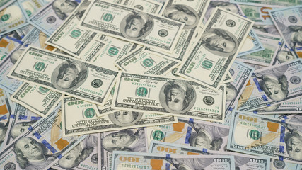 the old one hundred dollar bills against the background of new hundred-dollar bills