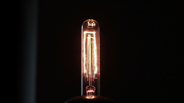 Light bulb fading up and down, close up, time lapse