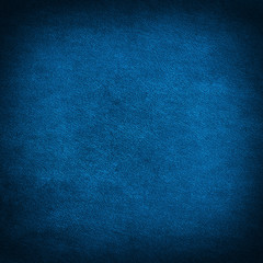 Blue leather texture closeup, useful as background
