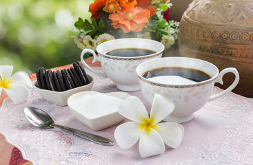 Double cup hot black coffee in fresh and happy morning for the lover relaxation on harmony natural green background 