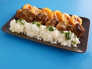 roasted pork ribs with ricepeaches and spices