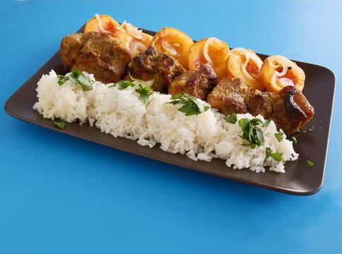 roasted pork ribs with ricepeaches and spices