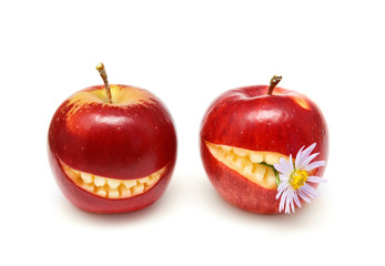 Apples with smiling mouth isolated on white background