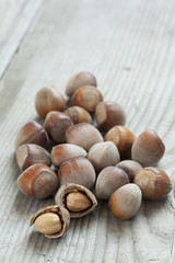 hazelnuts on wooden background