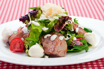  Warm salad with veal meat