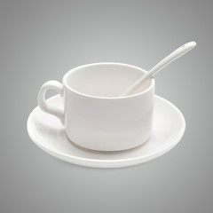 White coffee cup with a spoon on the saucer 
