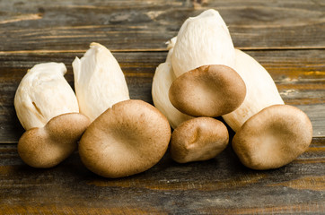 Fresh mushroom on wooden background
