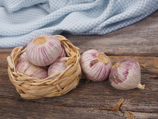 Garlic arranged on an old wooden table