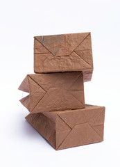 Stack of Brown shopping bags on white background