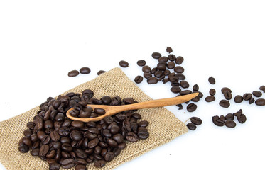 Coffee beans on spoon