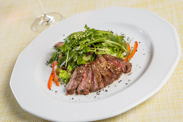 Beef with rucola salad