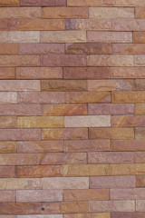 Plain stone wall for background.
