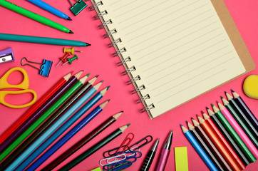 Blank notebook with school supplies