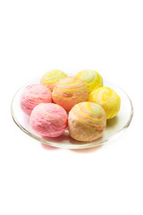 Chinese pastry in rainbow color on white background