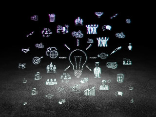 Fototapeta premium Business concept: Light Bulb in grunge dark room