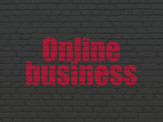 Finance concept: Online Business on wall background