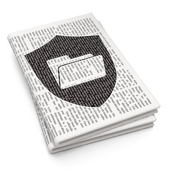 Finance concept: Folder With Shield on Newspaper background