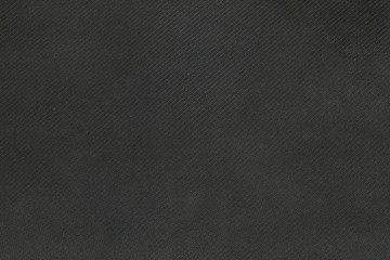 Closeup fabric at the black mouse pad background © kenkuza