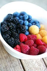Colourful fresh summer fruit in a bowl