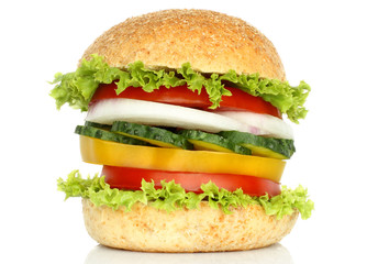 Healthy vegan burger with raw vegetables on white background
