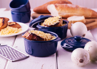 The preparation of a traditional French onion soup.
