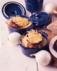 The preparation of a traditional French onion soup.