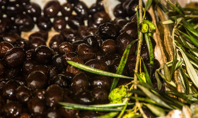 Brown olives for sale at a market