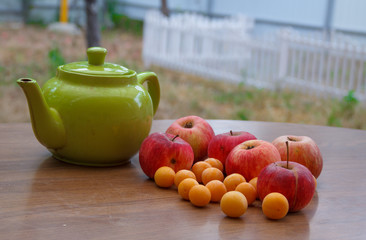 Green tea on the table with apples