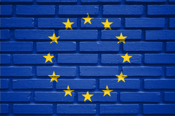 EU flag on brick wall