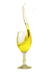 Yellow drink sloped in a glass