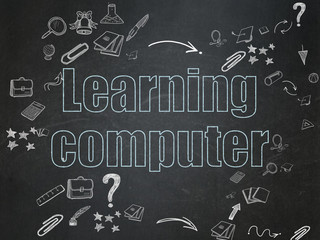 Education concept: Learning Computer on School Board background