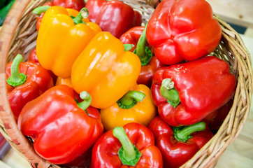 basket with red and orange peppers