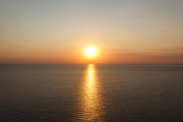 Naklejka na ściany i meble Golden sunset at the sea, summer romance. South resort.