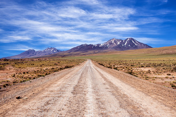Fototapeta na wymiar A dirt road in the Atacama Desert, Chile, 2013