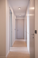 Fototapeta na wymiar Long corridor with doors