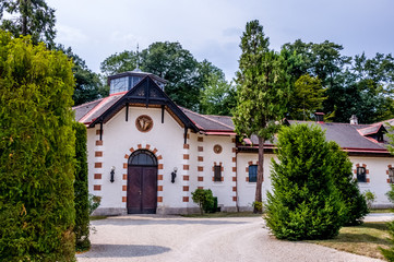 Horse stables in the courtyard of the Hermesvilla - a palace in the public park Lainzer Tiergarten,...