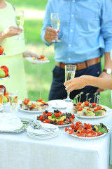 Obraz na płótnie Canvas Guests drink champagne on wedding ceremony