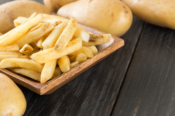 french fries on wood background