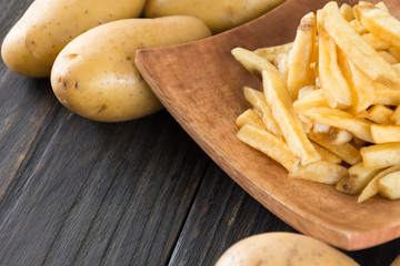 french fries on wood background