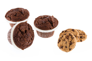 Chocolate chip muffin and cookies isolated on white background.