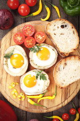 Fried eggs in potato shells