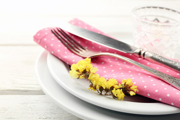 Summer table setting  on color wooden background