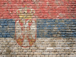 Serbian flag painted on a wall