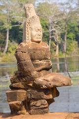 Fototapeta na wymiar Statue of ancient khmer warrior head at Angkor Wat