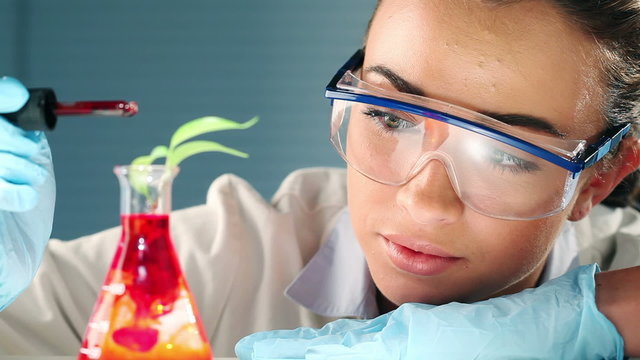 female lab technician conduction research